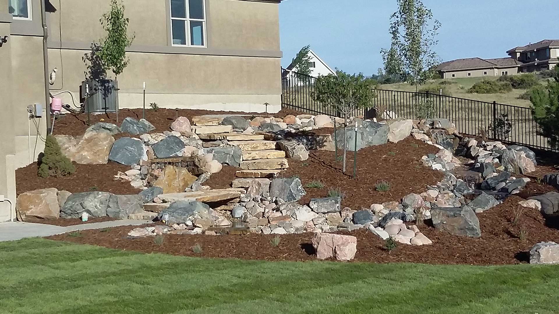 Custom Retaining Rock Steps and Landscaping